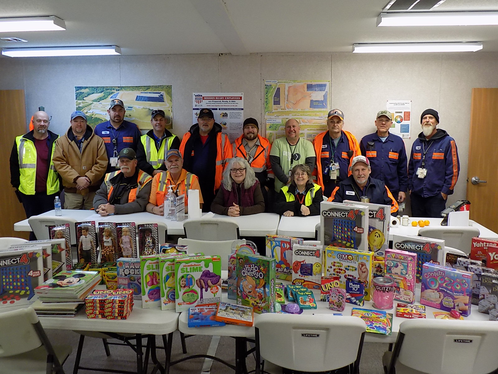 Photo: UCOR volunteers with collected gifts for Children's Hospital