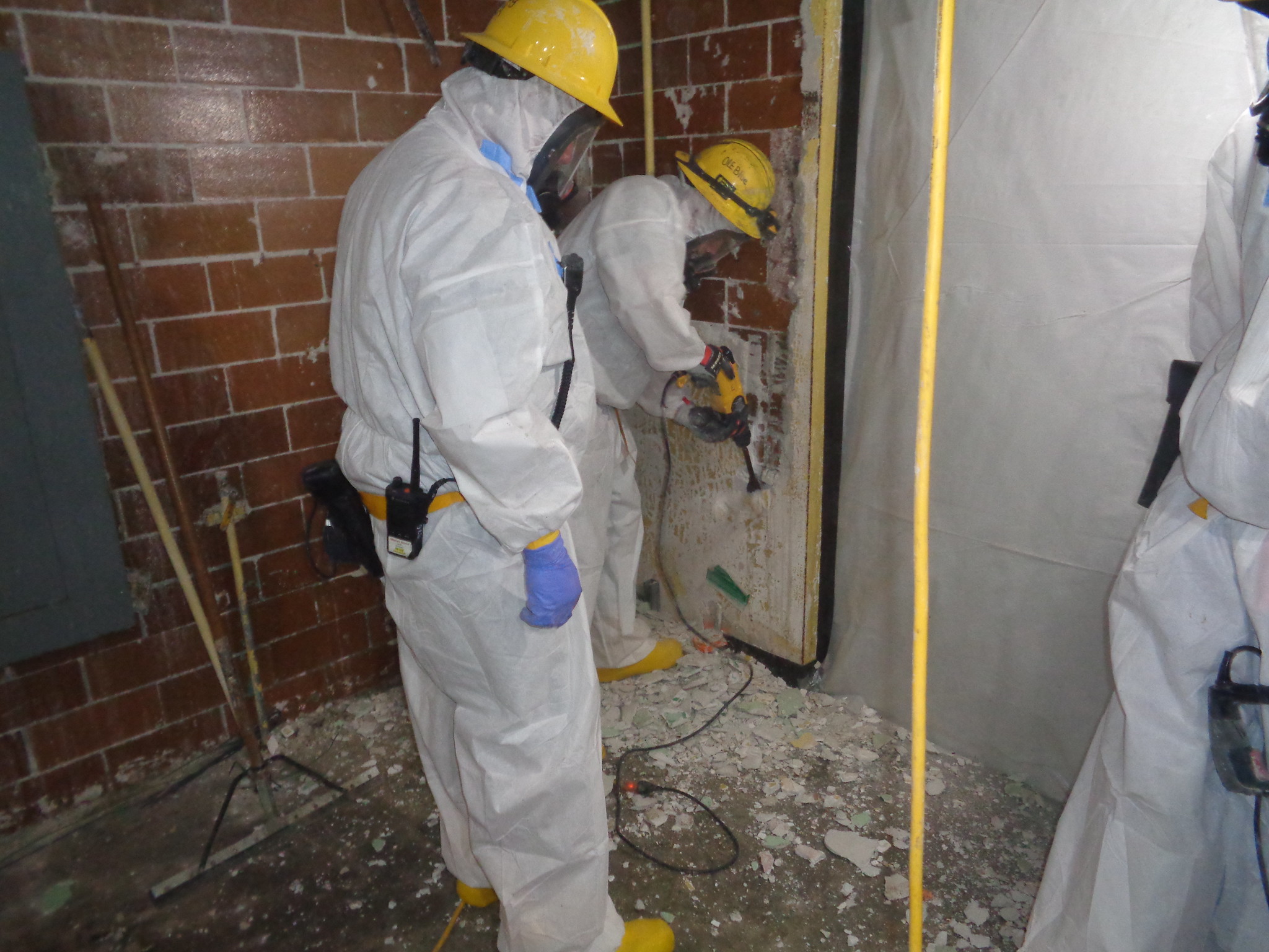 Photo: Workers conducting asbestos abatement