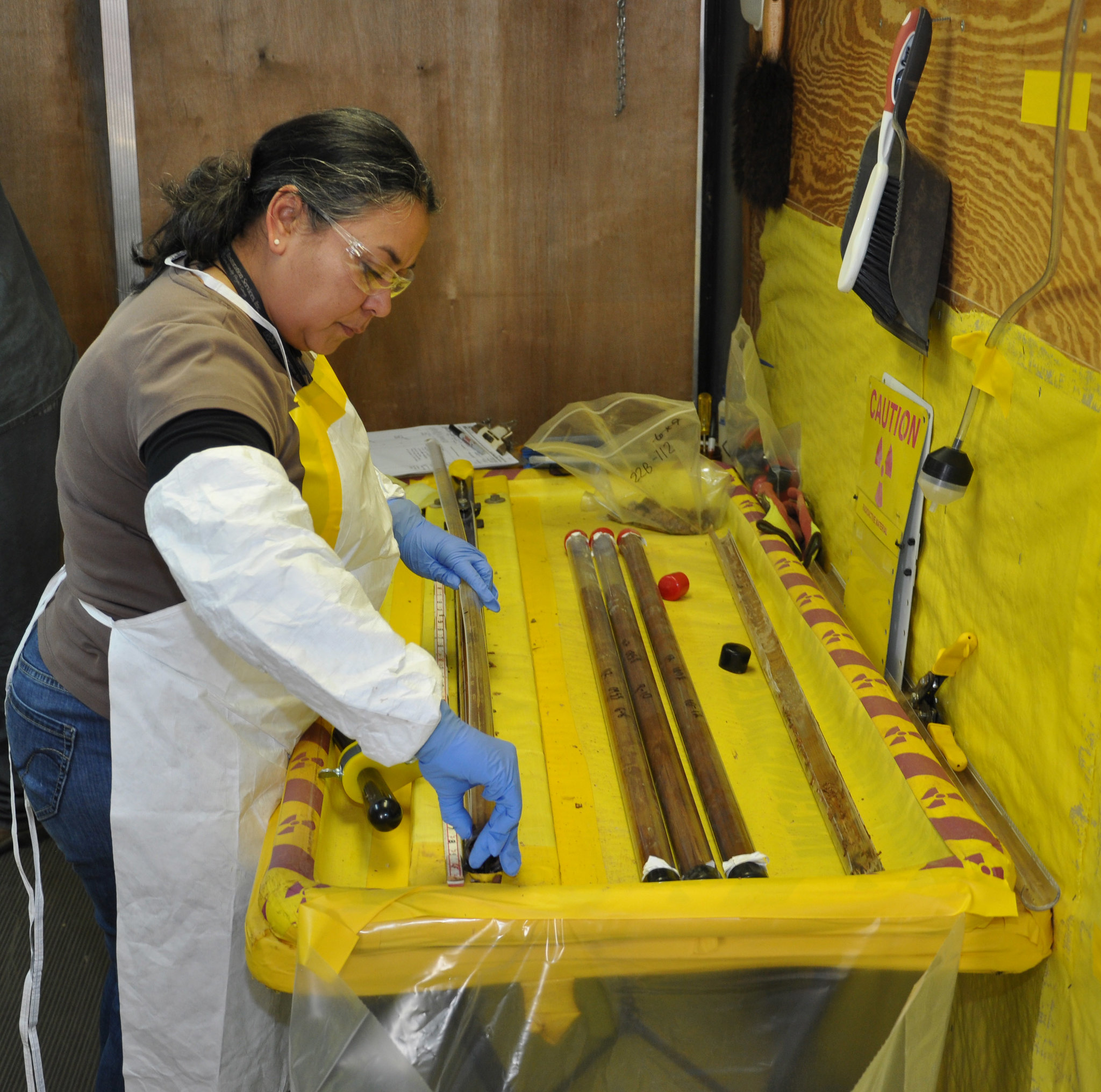 Photo: worker processing samples