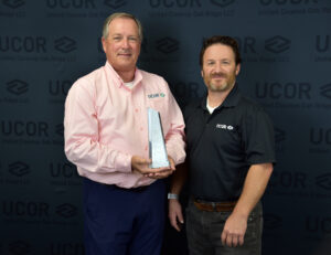 Photo of UCOR’s Clint Wolfley and Len Morgan with the Thomas J. Reynolds safety award
