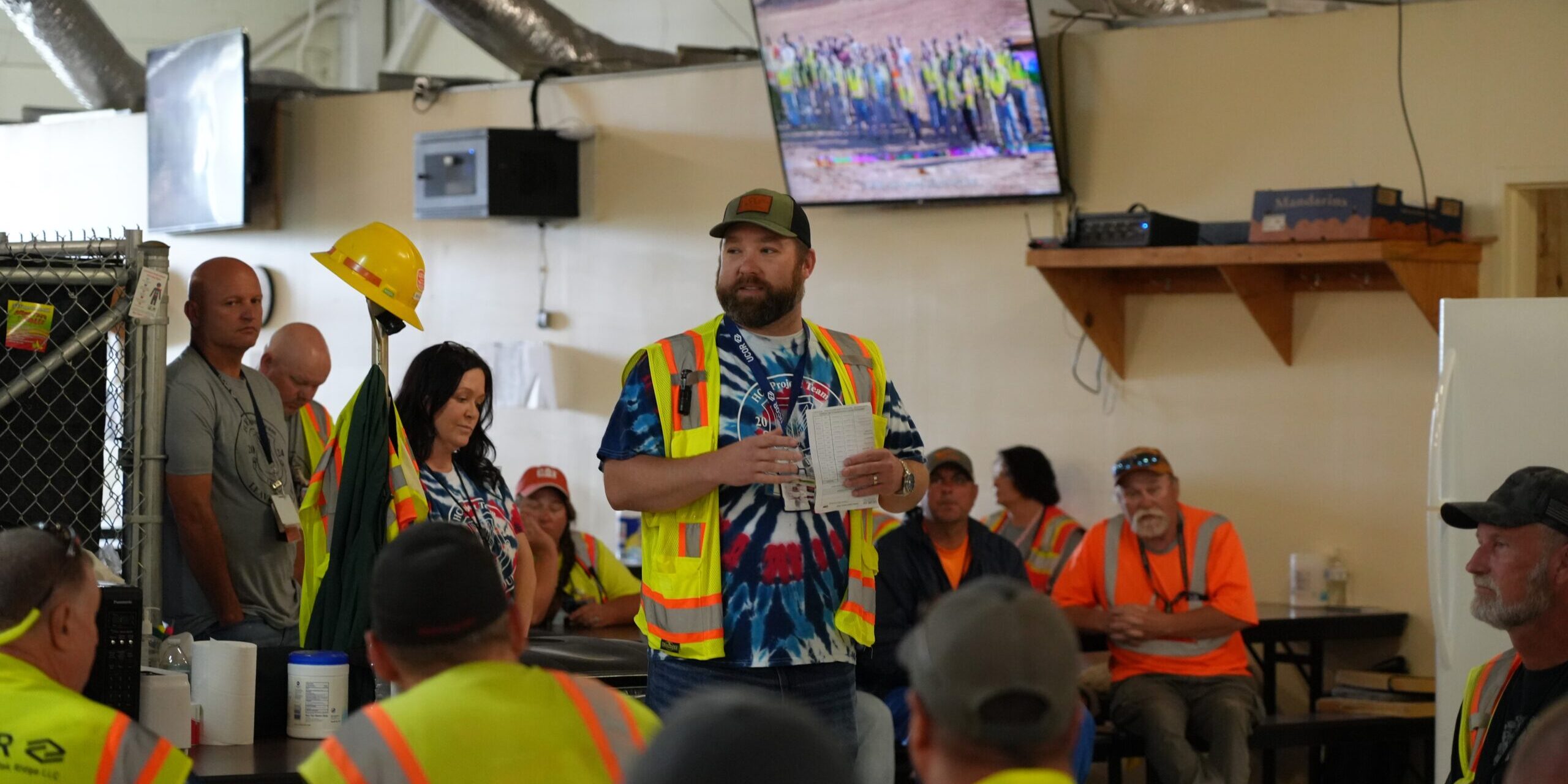 ETTP's Jimmy Hughes congratulates team at their celebratory cookout.