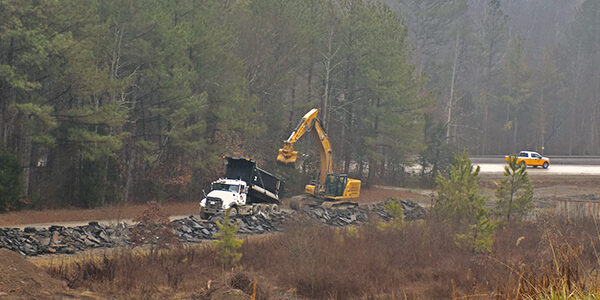 Crews recycling asphalt at Environmental Management Disposal Facility