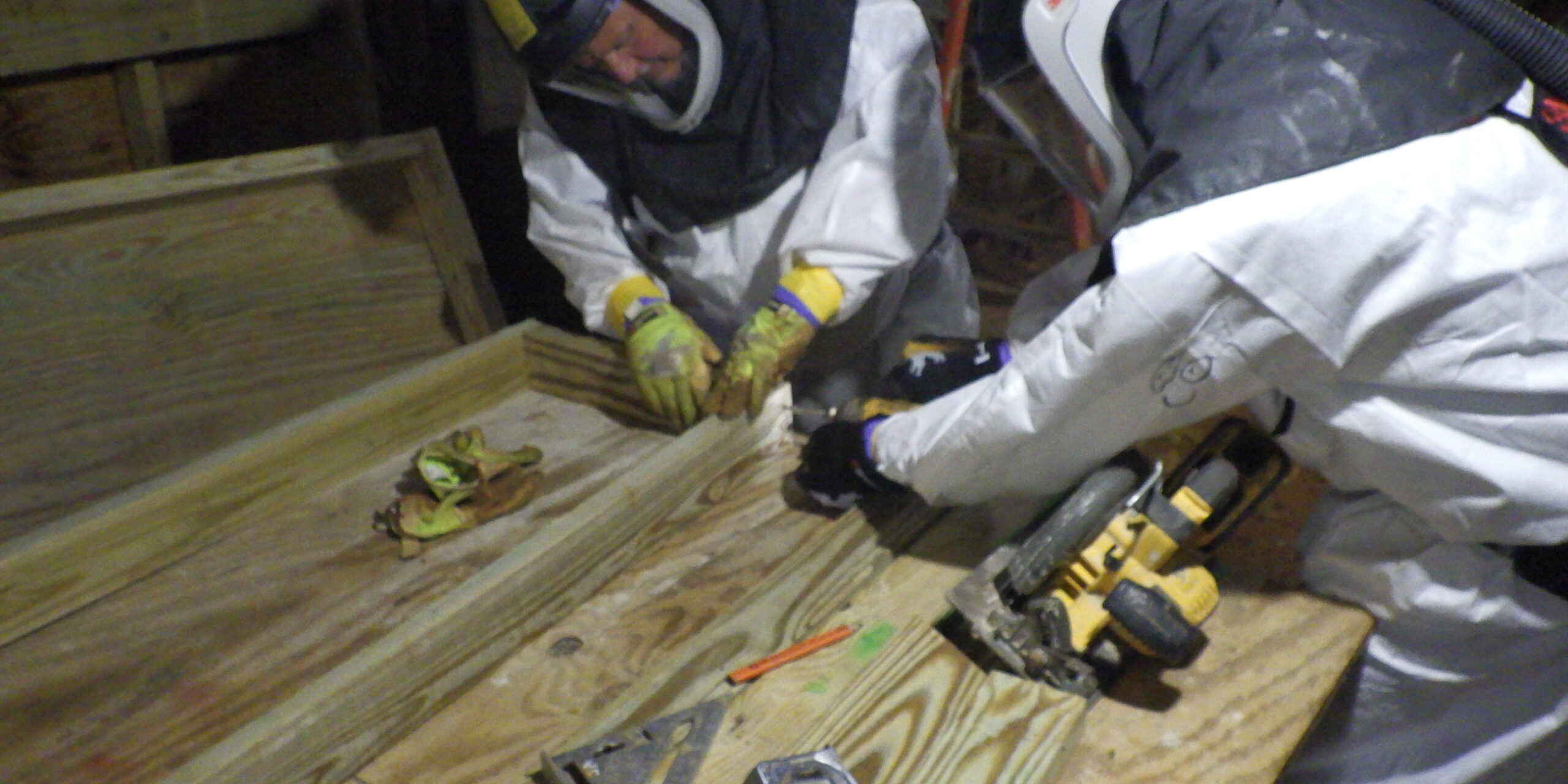 Alpha2 grout pour Carpenters preparing wood framing to support grout pouring at Y-12's Alpha-2 facility