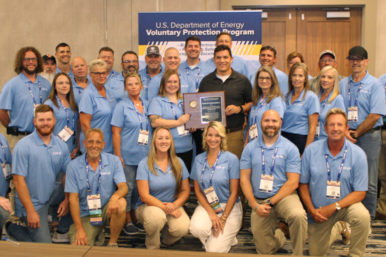 UCOR team accepting Star of Excellence award