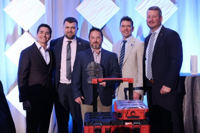 Clint Wolfley receiving the TAUC Safety Award