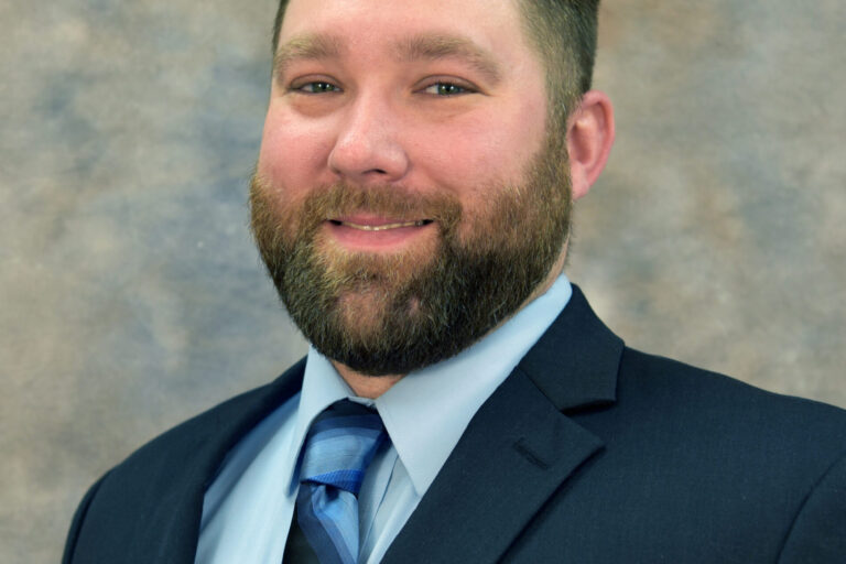 Headshot of Jimmy Hughes