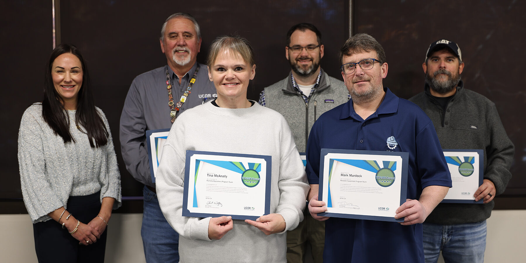 Group of six people at TeamsCount award presentation.