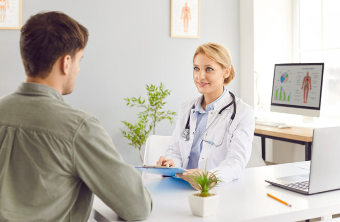 Female,Young,Doctor,Wearing,White,Medical,Uniform,Talking,To,Discuss